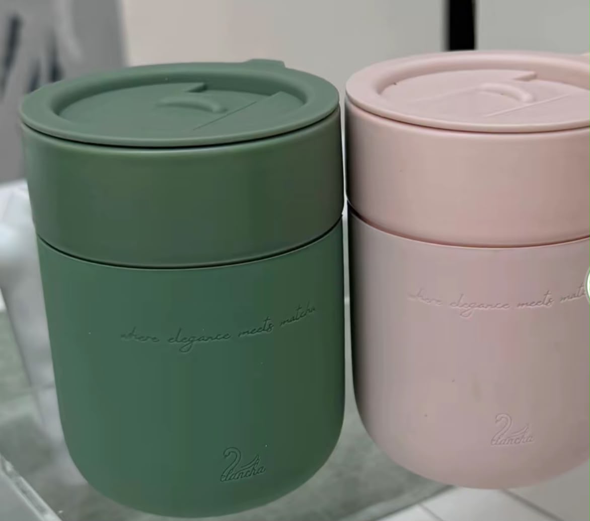 Green and blush ceramic travel cups